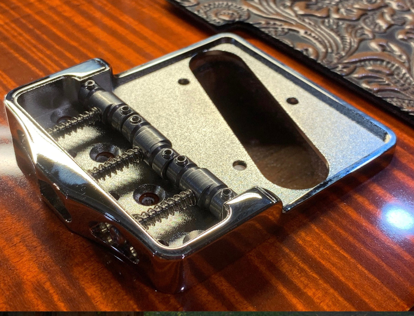 Lucky Dog Custom Milled guitar polished bridge plate for tele / telecaster guitars. Made in Tennessee. Nickel plated with brass compensated saddles.