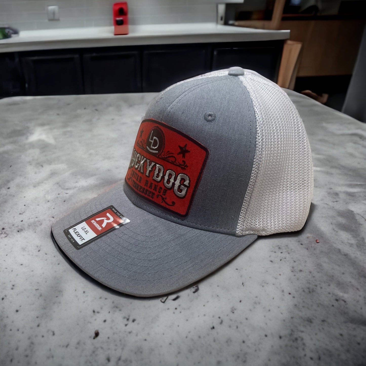 Lucky Dog Guitars Flexfit ball cap Heather gray and white mesh with 3 patch options to choose from.
