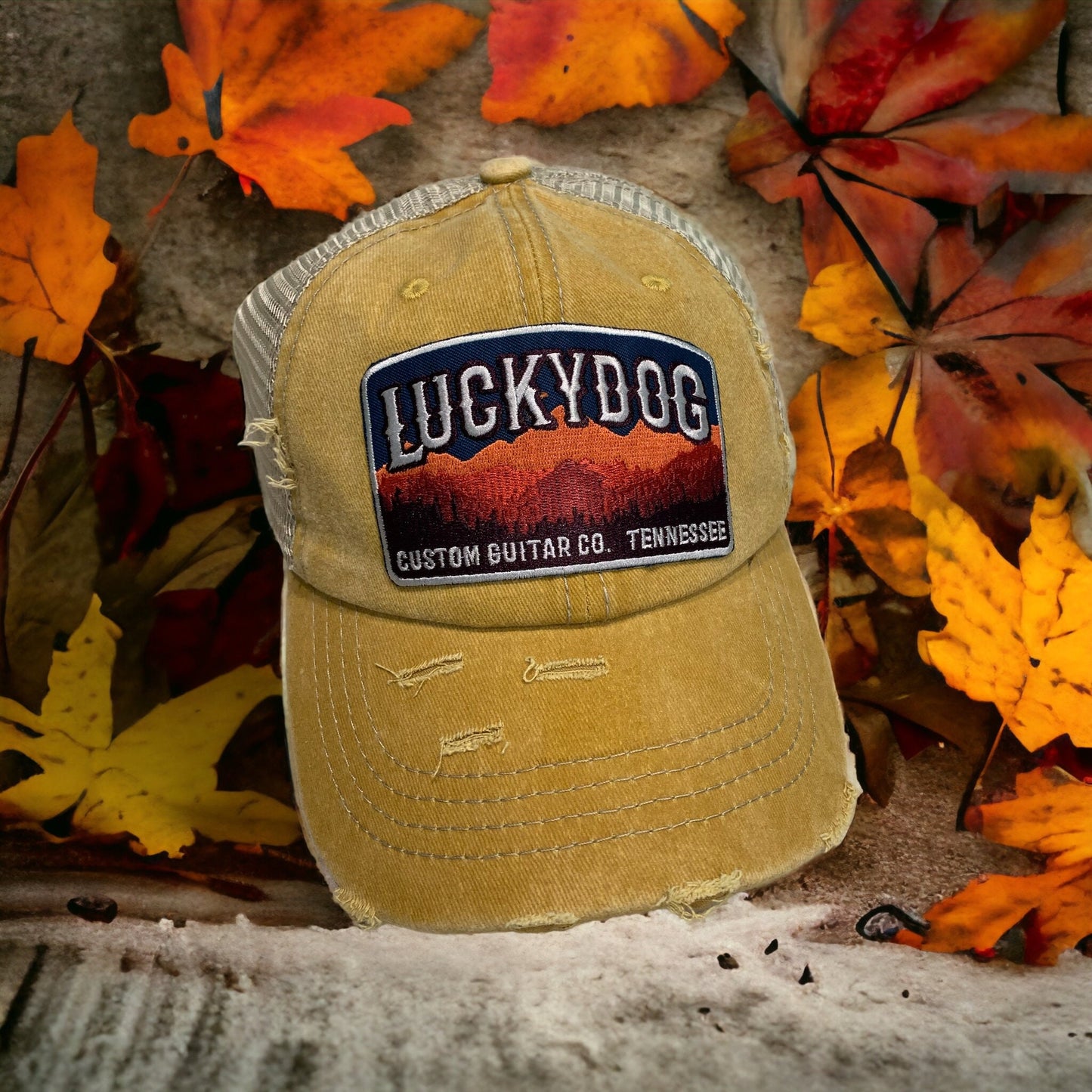 Lucky Dog Guitars distressed low profile Trucker Mesh Ball Cap Hat w/ soft, gold crown/gold bill and beige mesh back. Slide buckle