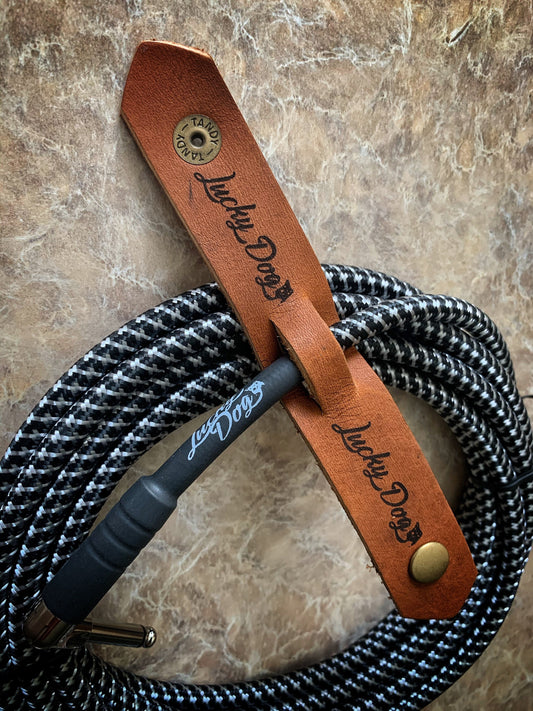 Lucky Dog Leather guitar cable wrap / retainer USA made, top quality leather and snaps. Engraved logo. Holds cables & keeps rolled up.