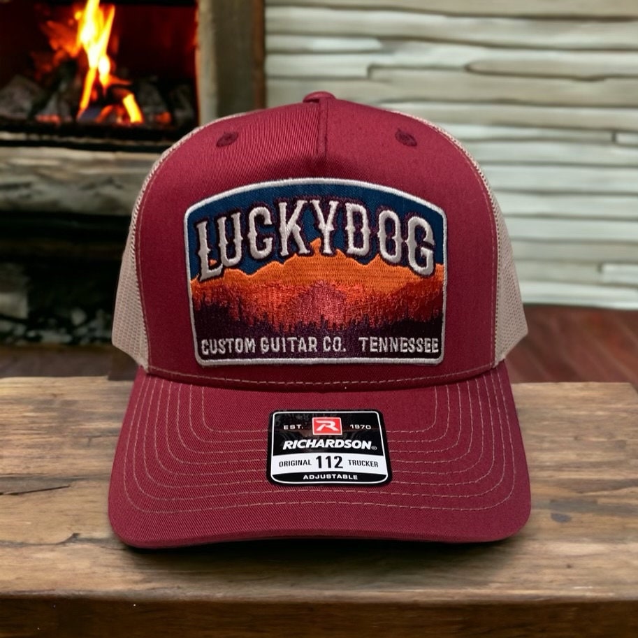 Lucky Dog Guitars Regular burgundy & beige Mesh Trucker Hat with patch. Richardson 112 structured trucker hat.