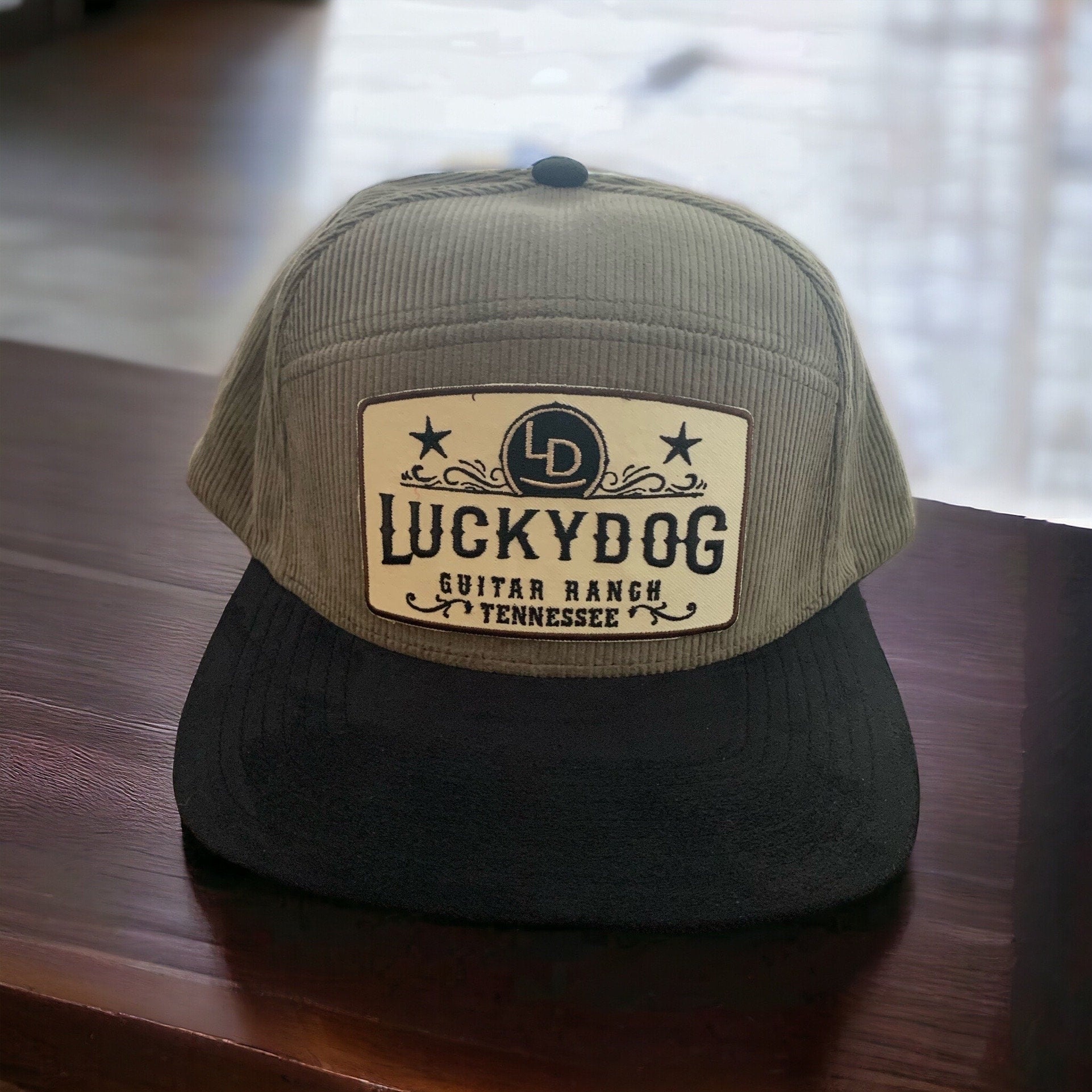 Lucky Dog Guitars Regular Size 6 panel Olive Courdoroy Camper-style hat with black visor and embroidered patch