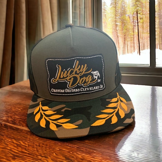 Lucky Dog Guitars “old school Truck Stop” camo high crown- flat bill- w/ gold bay leaves trucker hat